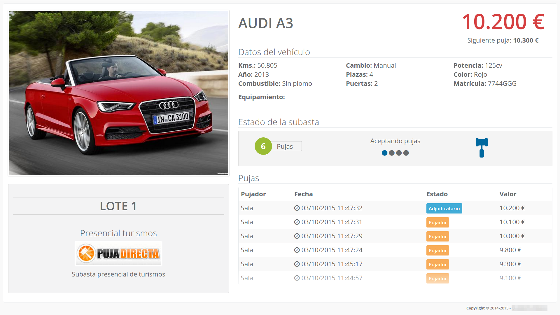 Pantalla grande del recinto mostrando información de subasta en vivo